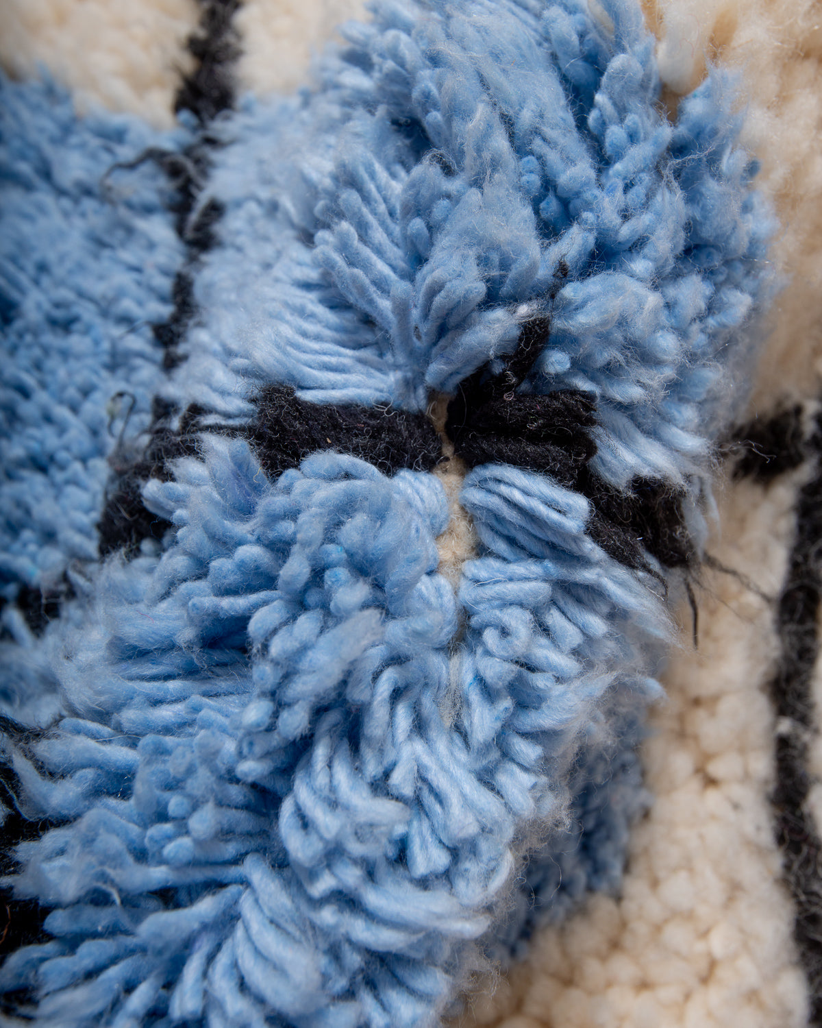 Modern, designer, handcrafted Berber rug from Morocco. Beniourain carpet with beautiful colours and patterns and fluffy wool texture.
